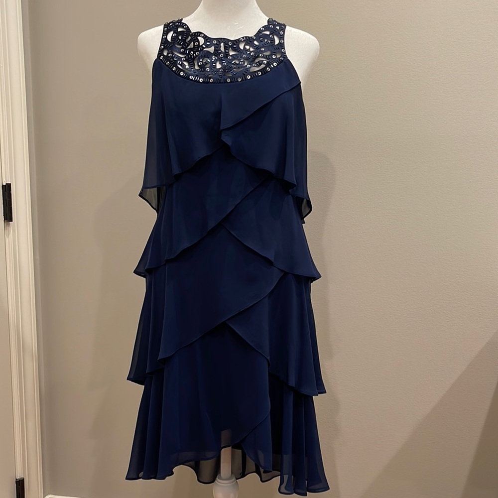 Navy cocktail dress, sleeveless with beaded neckline, size 6